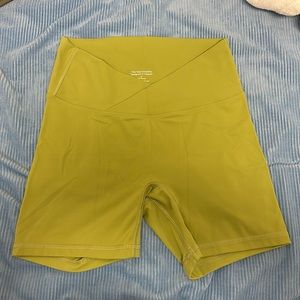 The ʻIwa company cross-over olive shorts